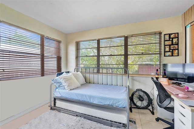 2435 Wilson St, Hollywood, FL 33020 - bedroom featuring an office area and light tile patterned floors