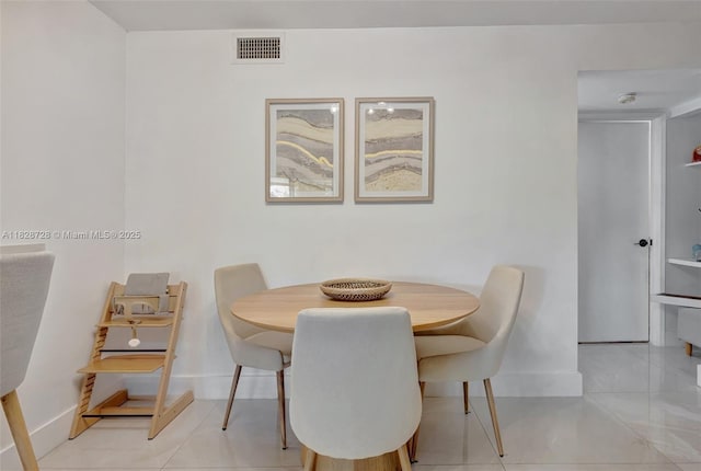 9255 SW 125th Ave Unit 108R, Miami, FL 33186 - dining room with baseboards and tile patterned floors