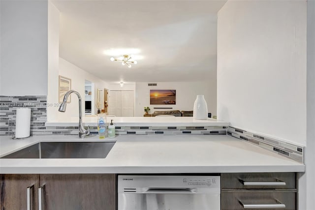 9255 SW 125th Ave Unit 108R, Miami, FL 33186 - kitchen with dishwasher, decorative backsplash, and light countertops