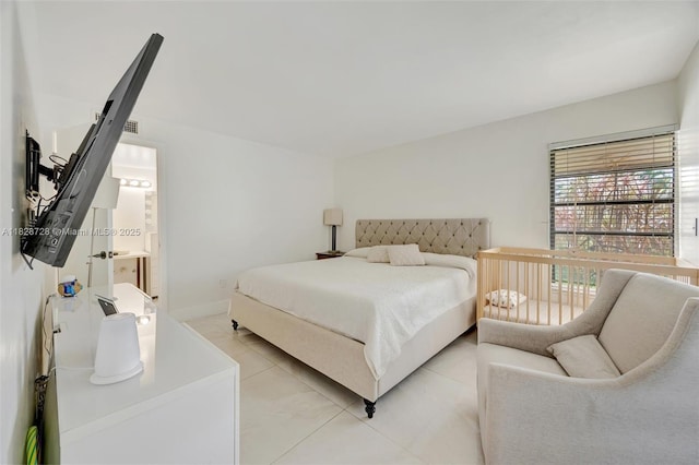 9255 SW 125th Ave Unit 108R, Miami, FL 33186 - bedroom featuring light tile patterned floors and connected bathroom