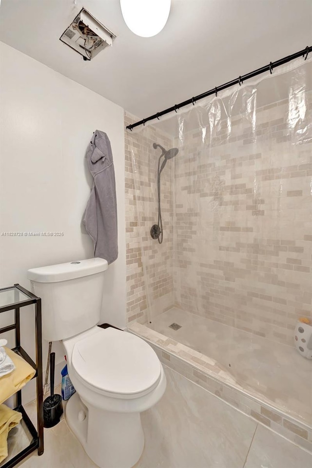 9255 SW 125th Ave Unit 108R, Miami, FL 33186 - bathroom featuring a tile shower and tile patterned floors