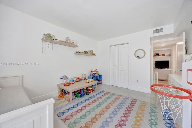 9255 SW 125th Ave Unit 108R, Miami, FL 33186 - tiled bedroom featuring a closet and baseboards