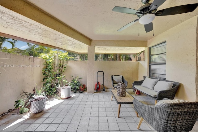 9255 SW 125th Ave Unit 108R, Miami, FL 33186 - fenced backyard with a patio area, ceiling fan, and an outdoor hangout area