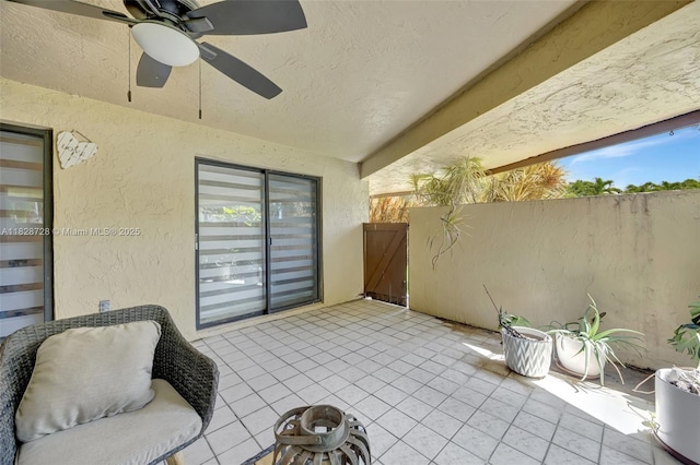 9255 SW 125th Ave Unit 108R, Miami, FL 33186 - view of patio featuring ceiling fan and a gate