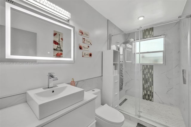 6601 Branch St, Hollywood, FL 33024 - full bathroom with a marble finish shower, vanity, and tile walls