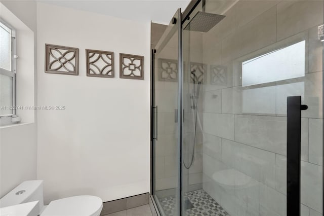 6601 Branch St, Hollywood, FL 33024 - bathroom featuring a shower stall and tile patterned flooring