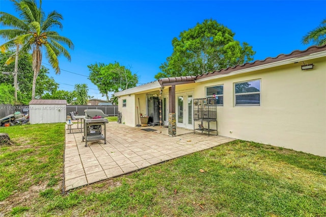 6601 Branch St, Hollywood, FL 33024 - view of patio with a storage unit and french doors