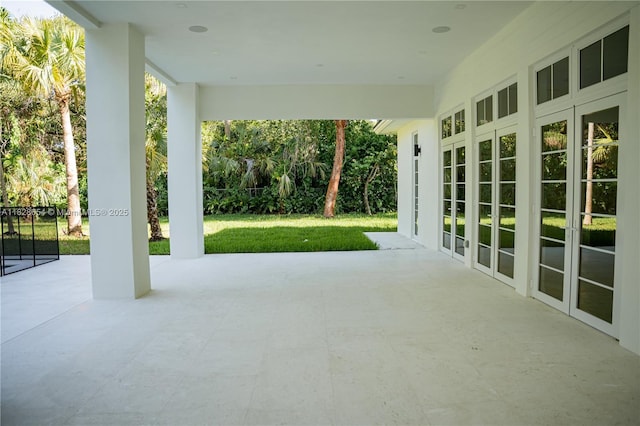 7605 SW 71st Ave, Miami, FL 33143 - view of patio featuring french doors