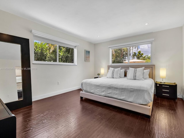 9510 NW 1st Ave, Miami Shores, FL 33150 - bedroom with multiple windows, wood finished floors, and recessed lighting