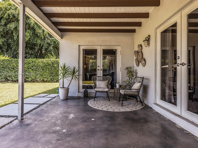 9510 NW 1st Ave, Miami Shores, FL 33150 - view of patio featuring french doors