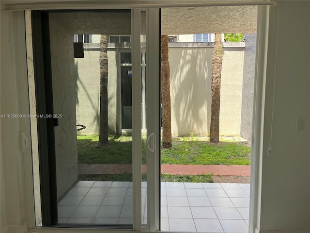 10000 NW 80th Ct Unit 2151, Hialeah Gardens, FL 33016 - doorway to outside with tile patterned flooring