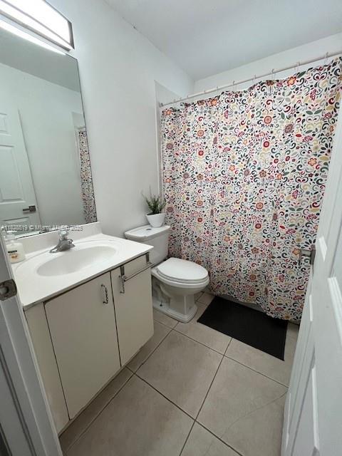 1988 SE 12th St, Homestead, FL 33035 - bedroom featuring hardwood / wood-style flooring and a textured ceiling