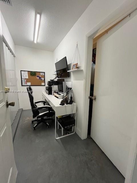 1988 SE 12th St, Homestead, FL 33035 - office with finished concrete floors and a textured ceiling