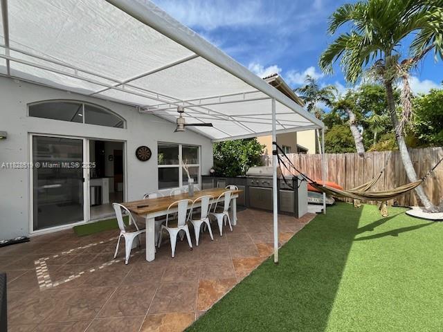 1988 SE 12th St, Homestead, FL 33035 - view of patio featuring area for grilling