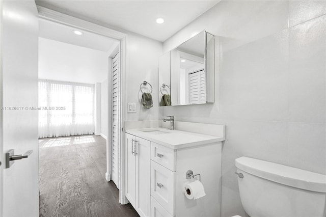 600 Three Islands Blvd Unit 1016, Hallandale Beach, FL 33009 - bathroom with vanity, wood finished floors, and recessed lighting