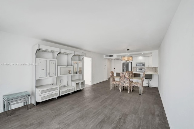 600 Three Islands Blvd Unit 1016, Hallandale Beach, FL 33009 - dining space featuring dark wood-style floors