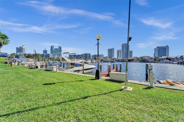 600 Three Islands Blvd Unit 1016, Hallandale Beach, FL 33009 - dock area featuring a skyline view, a yard, and a water view