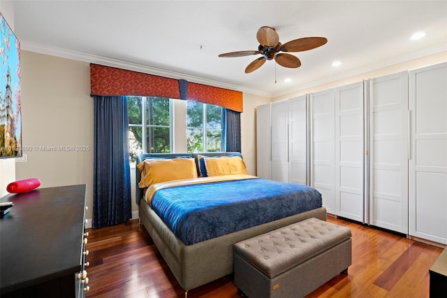 3055 NW 126th Ave Unit 107, Sunrise, FL 33323 - bedroom with crown molding, wood finished floors, recessed lighting, a closet, and ceiling fan