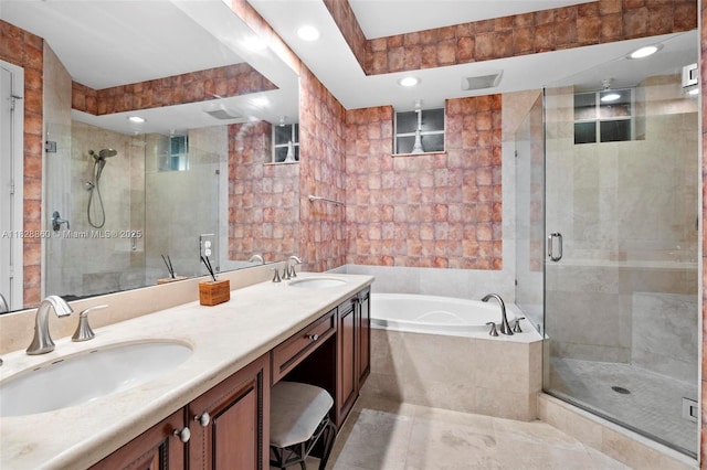 3055 NW 126th Ave Unit 107, Sunrise, FL 33323 - full bath featuring a stall shower, a bath, double vanity, tile walls, and tile patterned floors