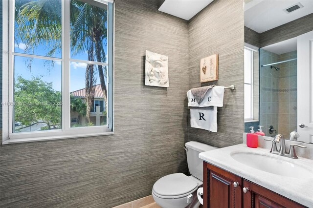 3055 NW 126th Ave Unit 107, Sunrise, FL 33323 - full bath with tile walls, vanity, and a tile shower