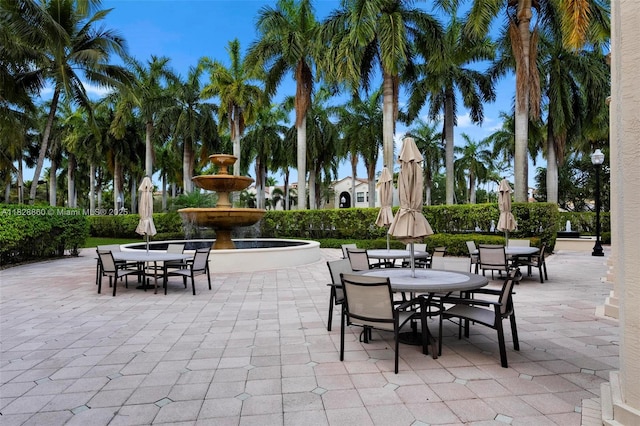 3055 NW 126th Ave Unit 107, Sunrise, FL 33323 - view of patio featuring outdoor dining space