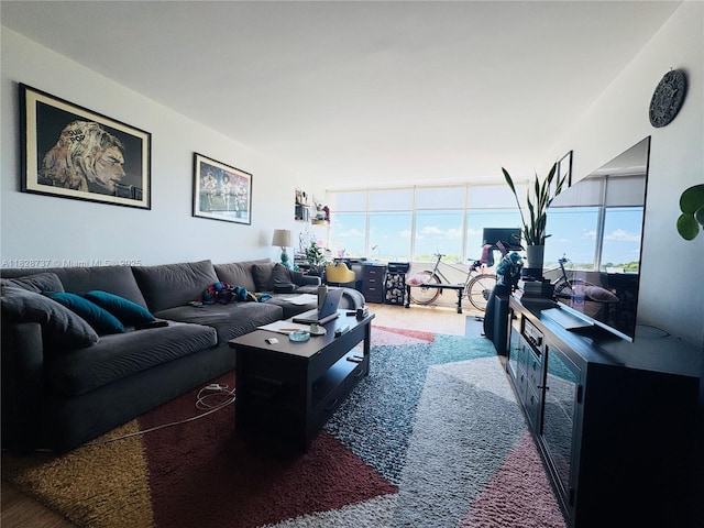 8233 Harding Ave Unit 603, Miami Beach, FL 33141 - living room featuring healthy amount of natural light and wood finished floors