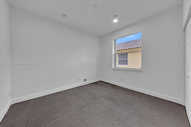 5046 SW 137th Ter, Miramar, FL 33027 - spare room with baseboards and recessed lighting
