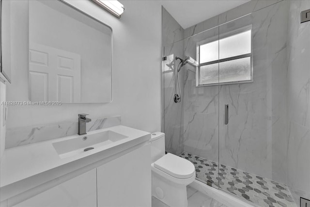 5046 SW 137th Ter, Miramar, FL 33027 - bathroom featuring a marble finish shower, marble finish flooring, and vanity