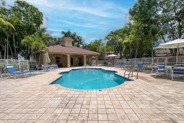 5046 SW 137th Ter, Miramar, FL 33027 - community pool featuring a patio