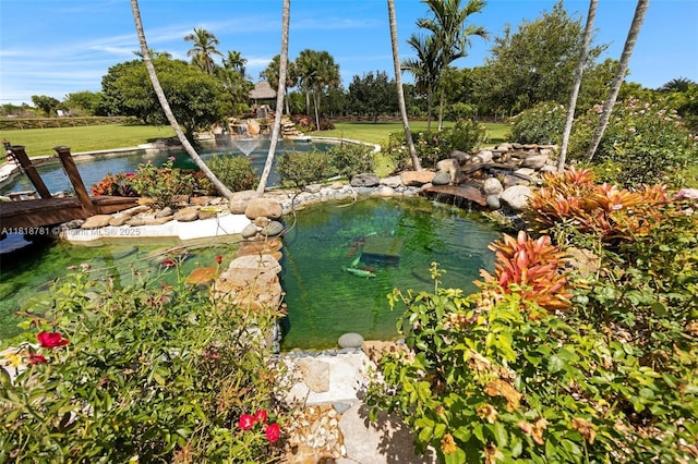 31260 SW 202nd Ave, Homestead, FL 33030 - view of yard with a garden pond