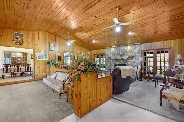 31260 SW 202nd Ave, Homestead, FL 33030 - tiled living area with vaulted ceiling, wooden walls, a ceiling fan, carpet flooring, and wood ceiling