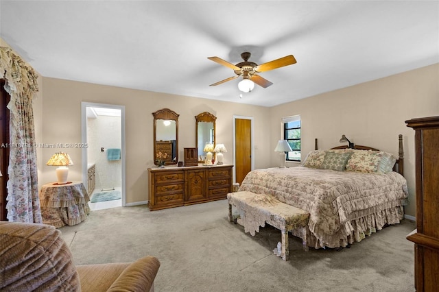 31260 SW 202nd Ave, Homestead, FL 33030 - bedroom with light carpet, connected bathroom, and a ceiling fan