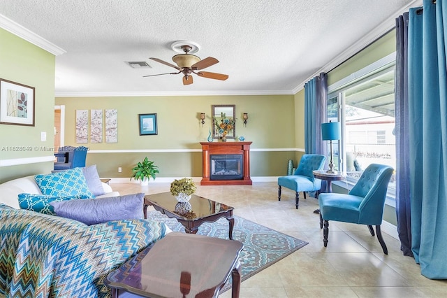 7306 NW 95th Way, Tamarac, FL 33321 - living area featuring ornamental molding, tile patterned flooring, ceiling fan, a glass covered fireplace, and a textured ceiling