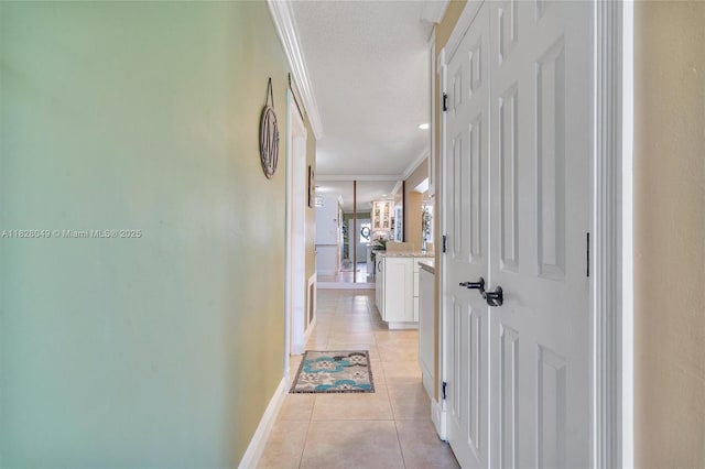 7306 NW 95th Way, Tamarac, FL 33321 - corridor featuring ornamental molding and light tile patterned flooring