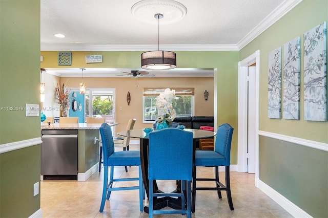 7306 NW 95th Way, Tamarac, FL 33321 - dining space featuring healthy amount of natural light, ornamental molding, a ceiling fan, a textured ceiling, and light tile patterned floors