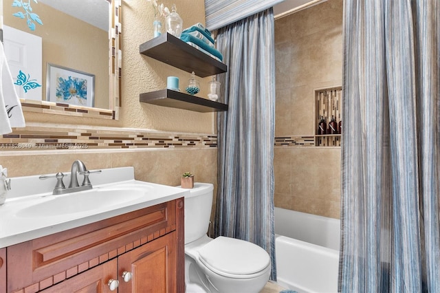 7306 NW 95th Way, Tamarac, FL 33321 - full bathroom featuring shower / bathtub combination with curtain, vanity, and tile walls