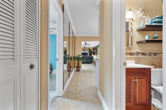 7306 NW 95th Way, Tamarac, FL 33321 - hall featuring crown molding and light tile patterned flooring