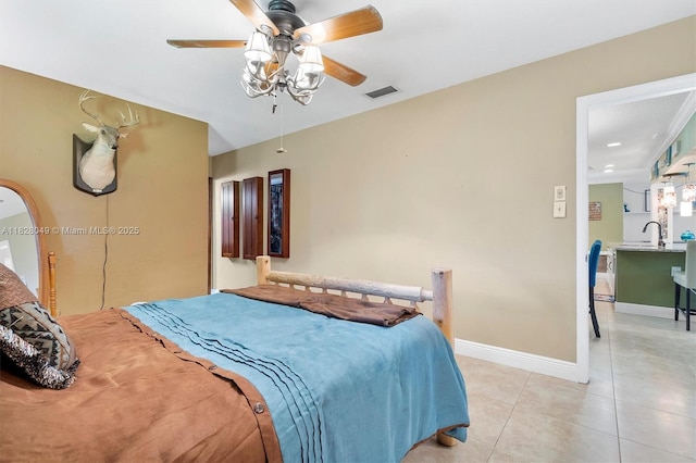 7306 NW 95th Way, Tamarac, FL 33321 - bedroom featuring light tile patterned floors and a ceiling fan