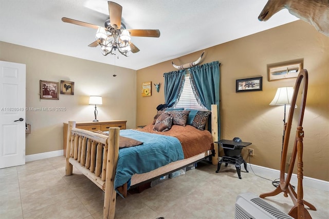 7306 NW 95th Way, Tamarac, FL 33321 - bedroom with a ceiling fan and light tile patterned floors