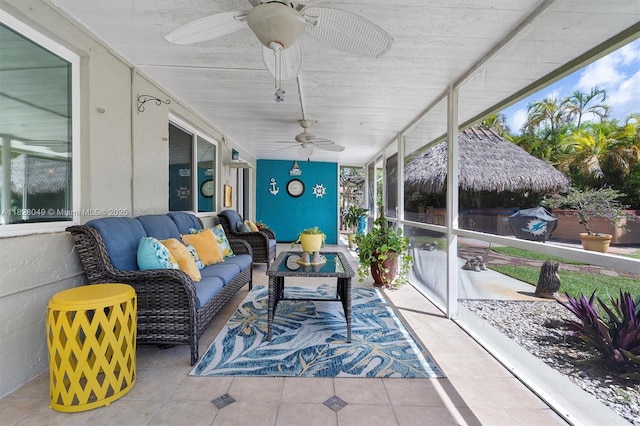 7306 NW 95th Way, Tamarac, FL 33321 - sunroom / solarium featuring a ceiling fan, a wall of windows, outdoor lounge area, and tile patterned floors