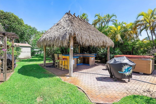 7306 NW 95th Way, Tamarac, FL 33321 - view of patio / terrace featuring a hot tub