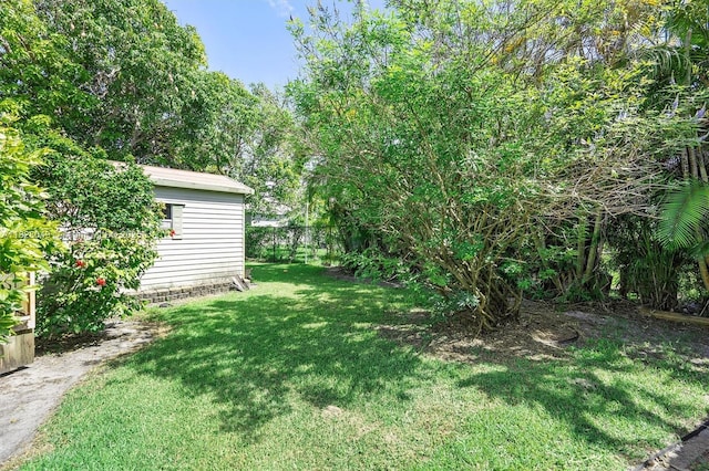 7306 NW 95th Way, Tamarac, FL 33321 - view of yard with an outbuilding