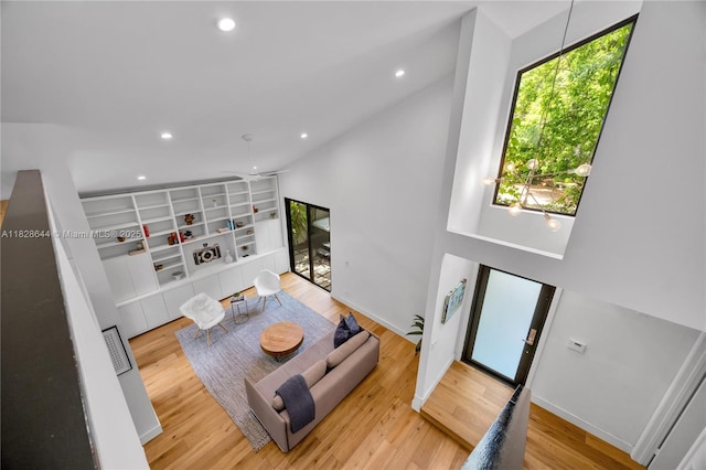 2427 Tequesta Ln, Miami, FL 33133 - living room with wood finished floors and recessed lighting