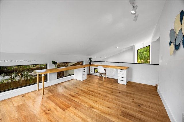 2427 Tequesta Ln, Miami, FL 33133 - additional living space featuring lofted ceiling, an office area, wood finished floors, and recessed lighting
