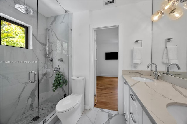 2427 Tequesta Ln, Miami, FL 33133 - full bath with a marble finish shower and double vanity