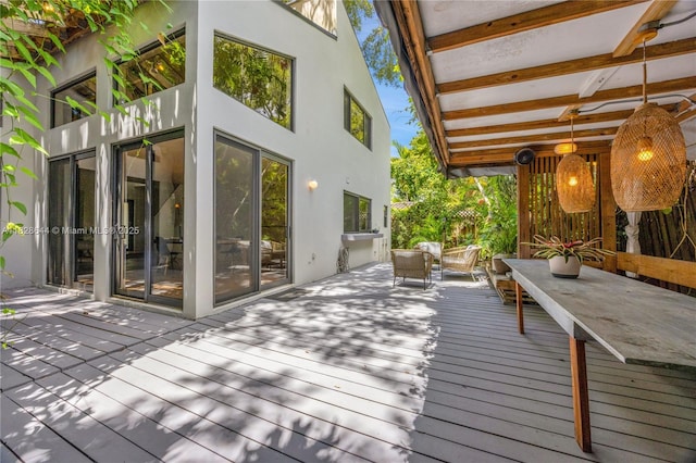 2427 Tequesta Ln, Miami, FL 33133 - wooden terrace with outdoor lounge area