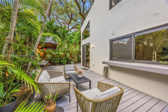 2427 Tequesta Ln, Miami, FL 33133 - wooden deck with an outdoor hangout area