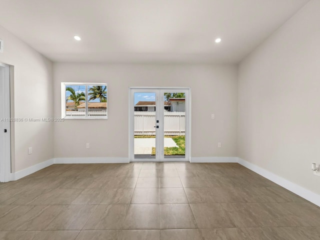 3455 E 1st Ct, Hialeah, FL 33013 - empty room featuring recessed lighting and tile patterned floors