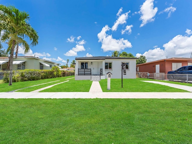 3455 E 1st Ct, Hialeah, FL 33013 - view of front facade featuring stucco siding and covered porch