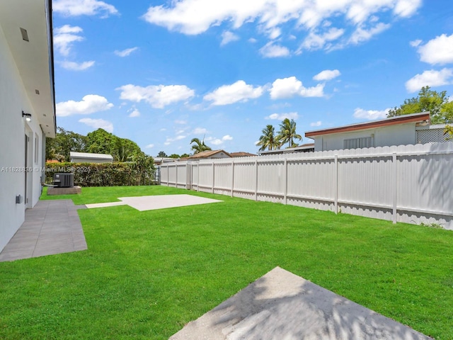 3455 E 1st Ct, Hialeah, FL 33013 - fenced backyard featuring a patio area